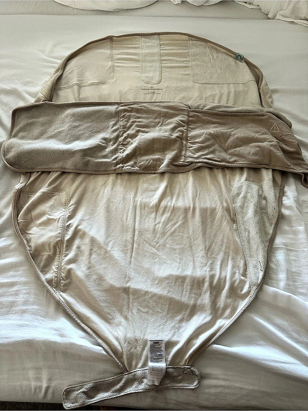 taking cara babies b.e.s.t. swaddle coconut cream